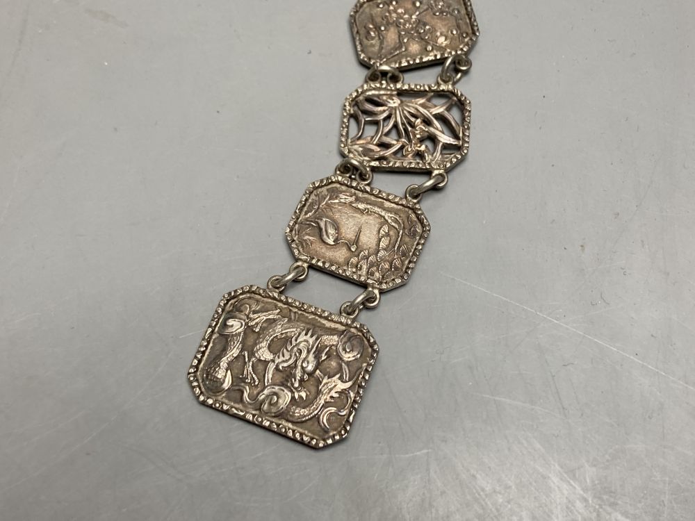 An early 20th century Chinese Export white metal belt by Wang Hing, Hong Kong and other items.